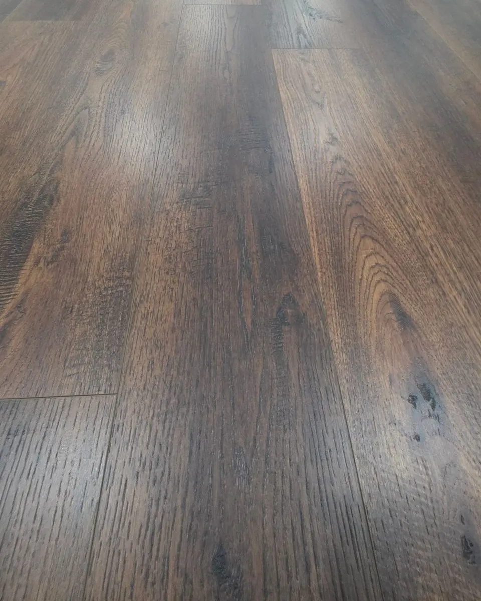 After: the same textured LVP floor with the grain clear after cleaning by Maddox Surface